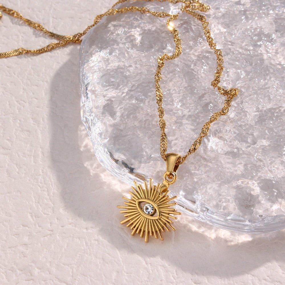 Collier pendentif oeil avec rayons vintage plaqué or