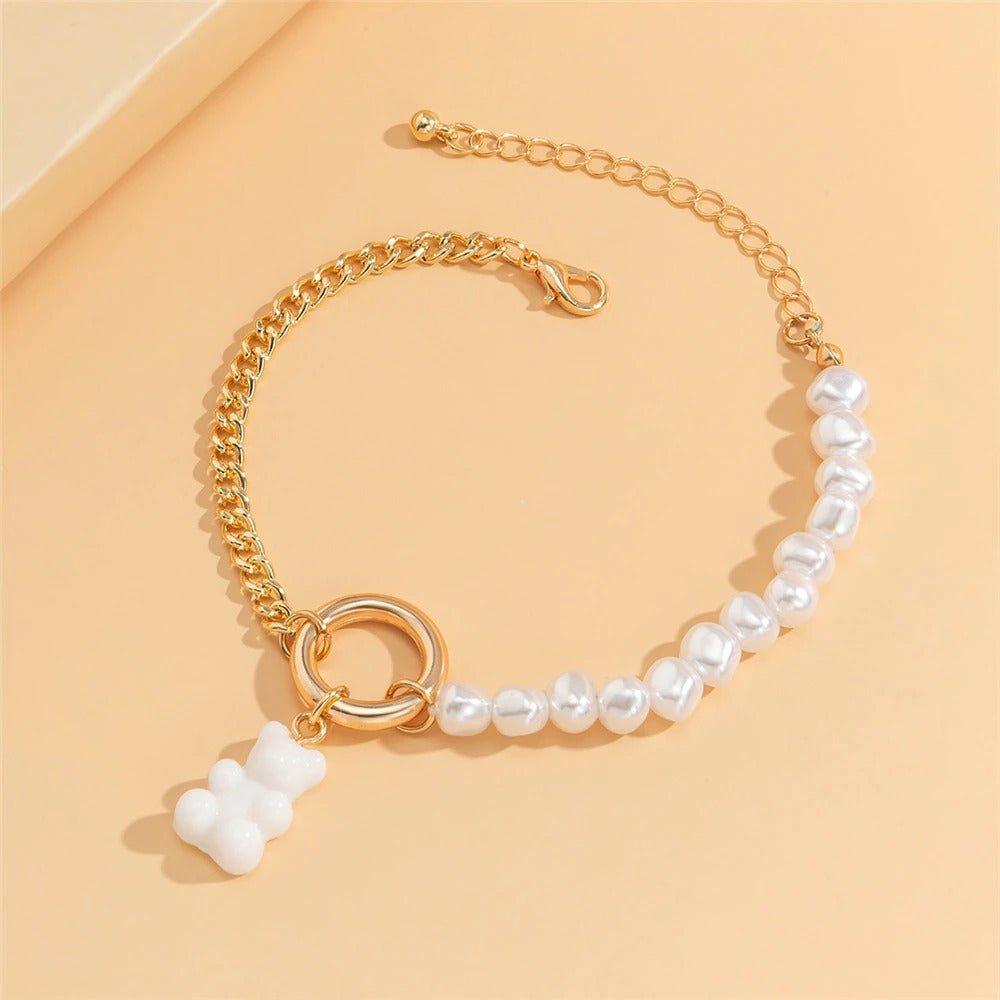 Collier perlé et pendentif ourson blanc