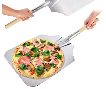 Pelle à pizza en métal avec manche en bois