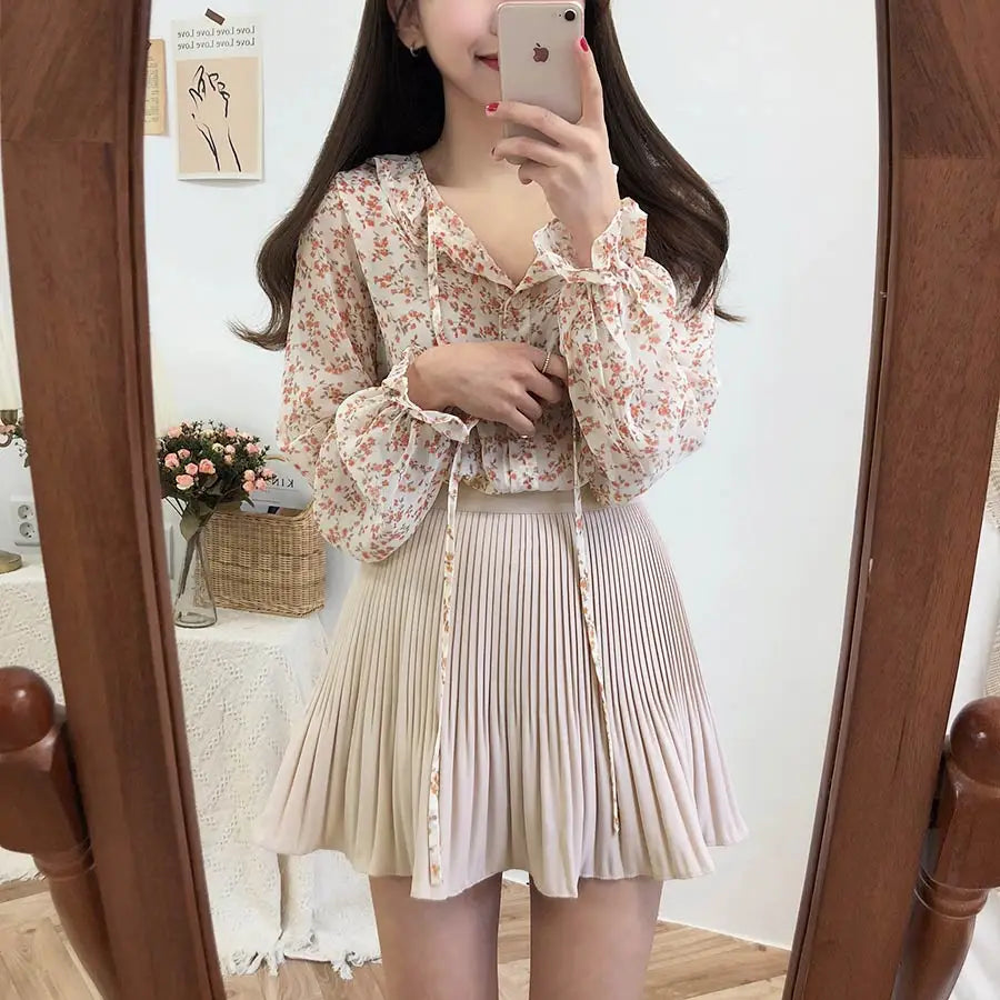 Jupe courte plissée beige