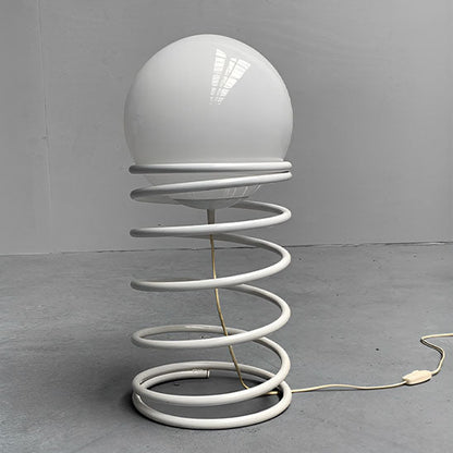 Lampe de table filaire à spirale de couleur blanche et non allumée 