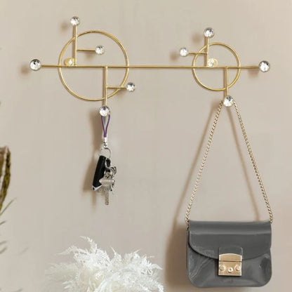 Porte manteau or