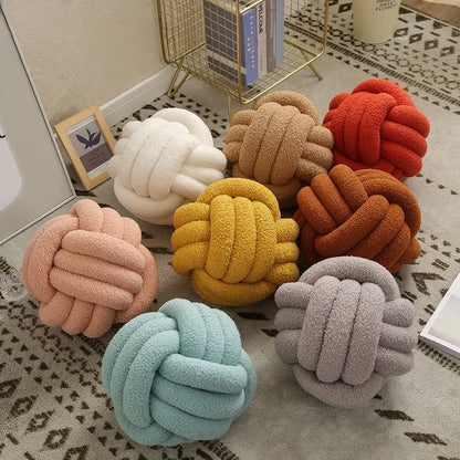 Coussin boule tressé