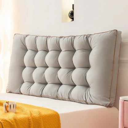 Gros coussin tête de lit