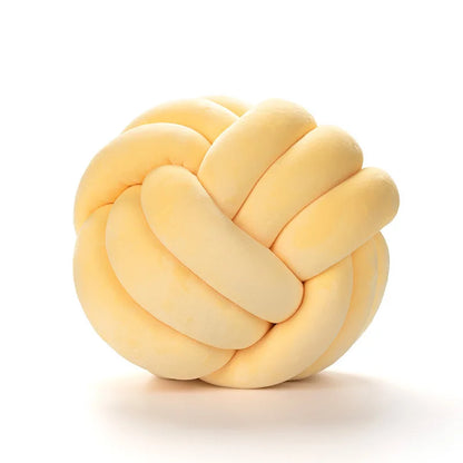 Coussin noeud jaune