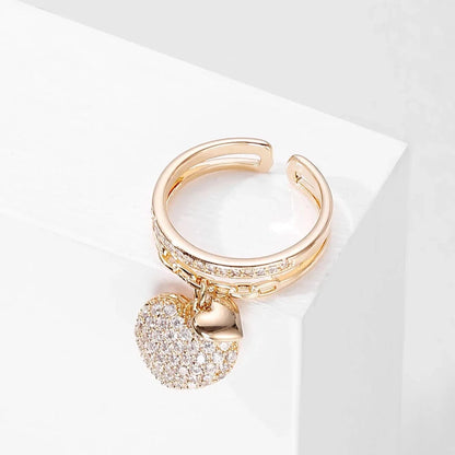 Bague pendentif coeurs diamants or / or rose / argent