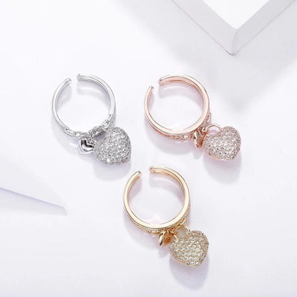 Bague pendentif coeurs diamants or / or rose / argent