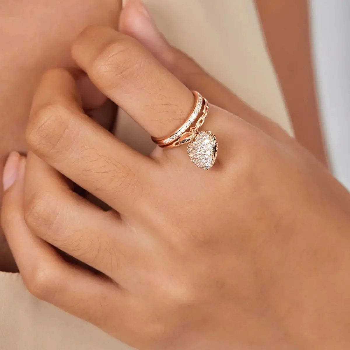 Bague pendentif coeurs diamants or / or rose / argent