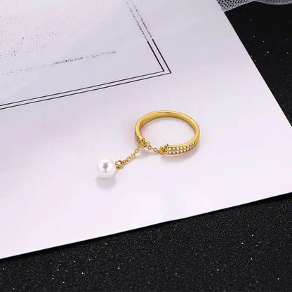 Bague pendentif réglable diamants perle
