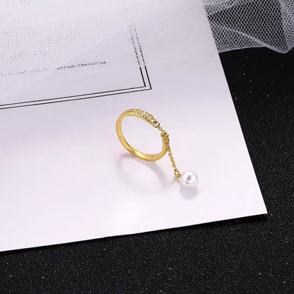 Bague pendentif réglable diamants perle