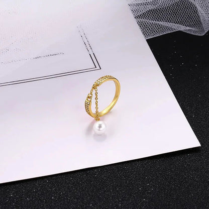 Bague pendentif réglable diamants perle
