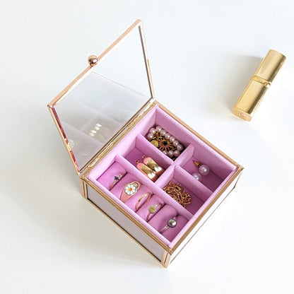 Boîte à bijoux en verre doré et velours rose