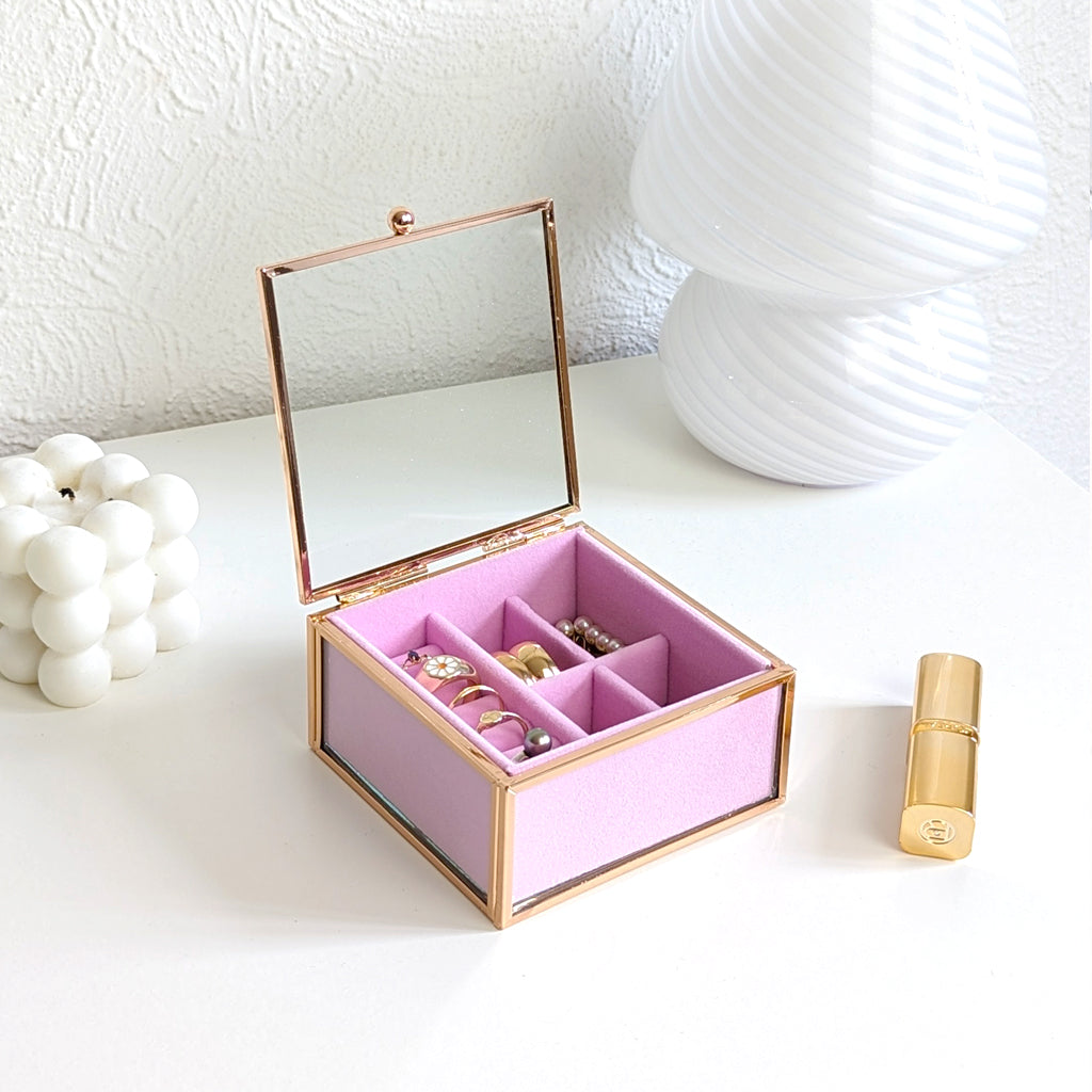 Boîte à bijoux en verre doré et velours rose
