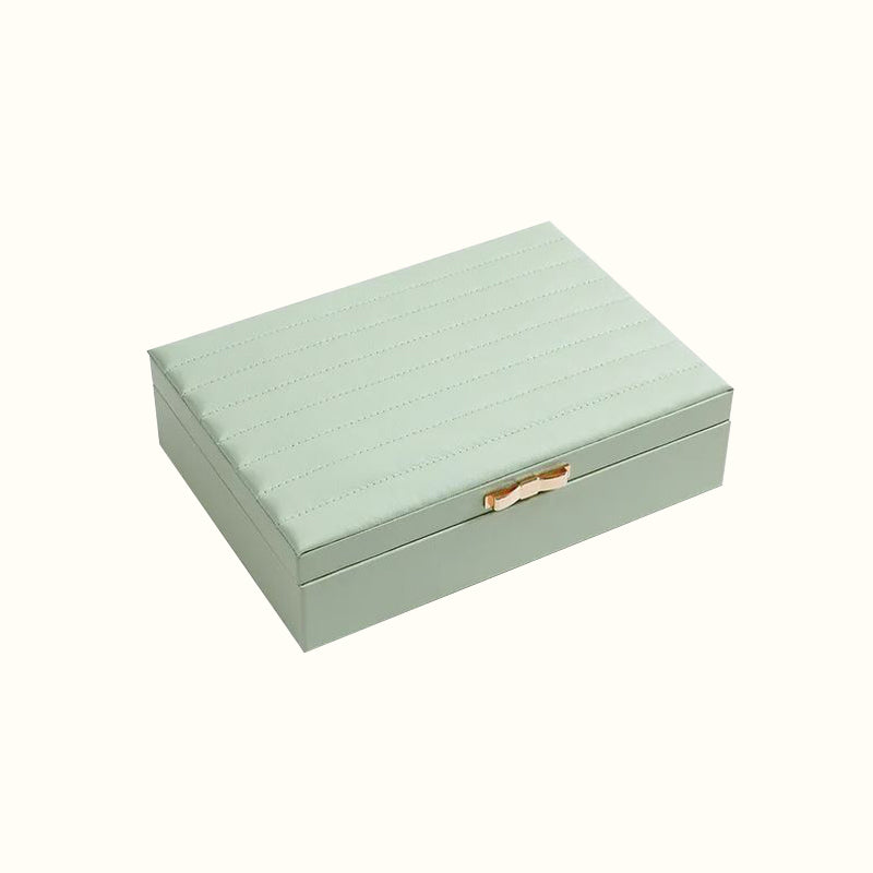 Boîte à bijoux nœud coquette en cuir