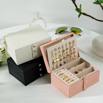 Boite à bijoux à compartiments format livre