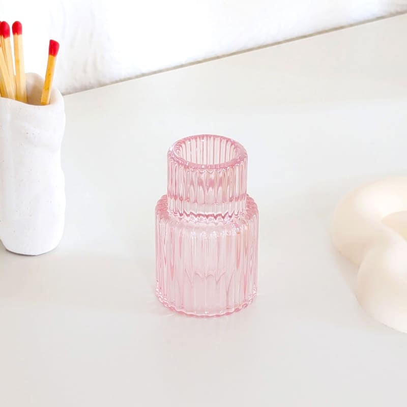 Bougeoir en verre rose