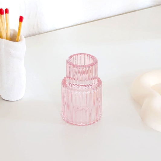 Bougeoir en verre rose