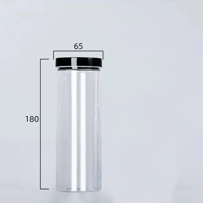 Bouteille de rangement circulaire à couvercle noir 520ml