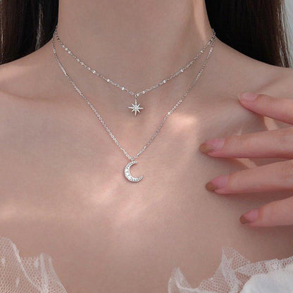 Collier double chaîne pendentif lune et étoile à strass
