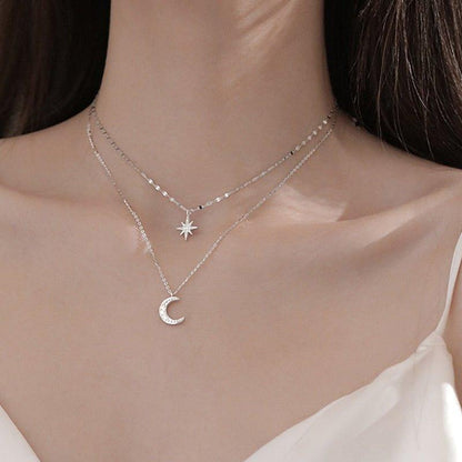 Collier double chaîne pendentif lune et étoile à strass