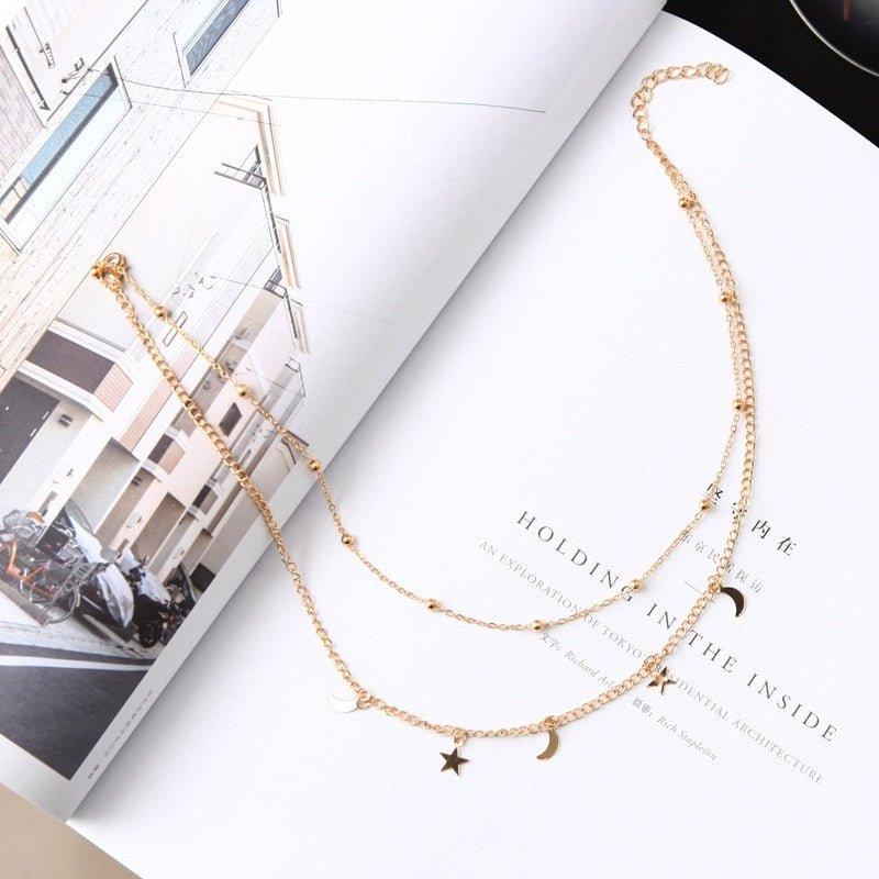 Collier double chaîne pendentif lunes et étoiles plaqué or / argent