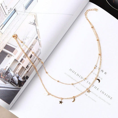 Collier double chaîne pendentif lunes et étoiles plaqué or / argent