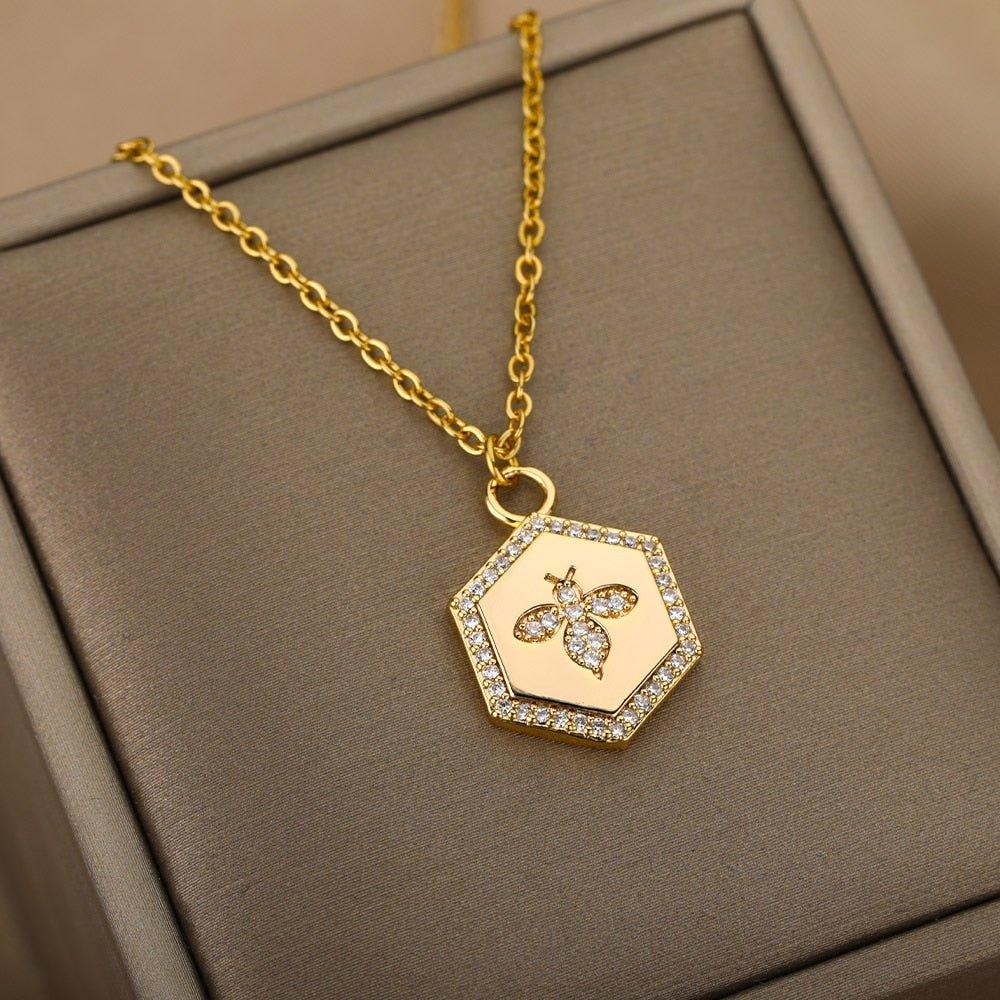 Collier pendentif abeille cadre hexagonale strass