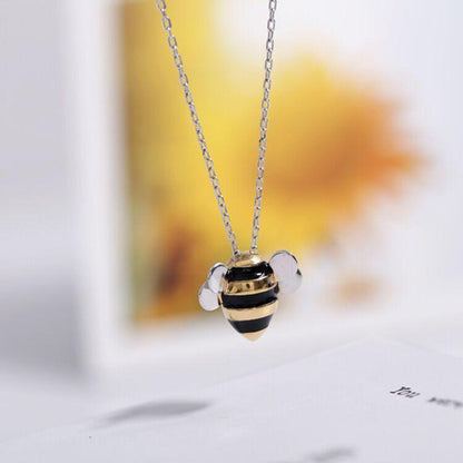 Collier pendentif abeille rond or / argent