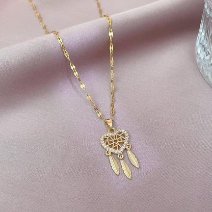 Collier pendentif attrape rêve coeur plaqué or / argent
