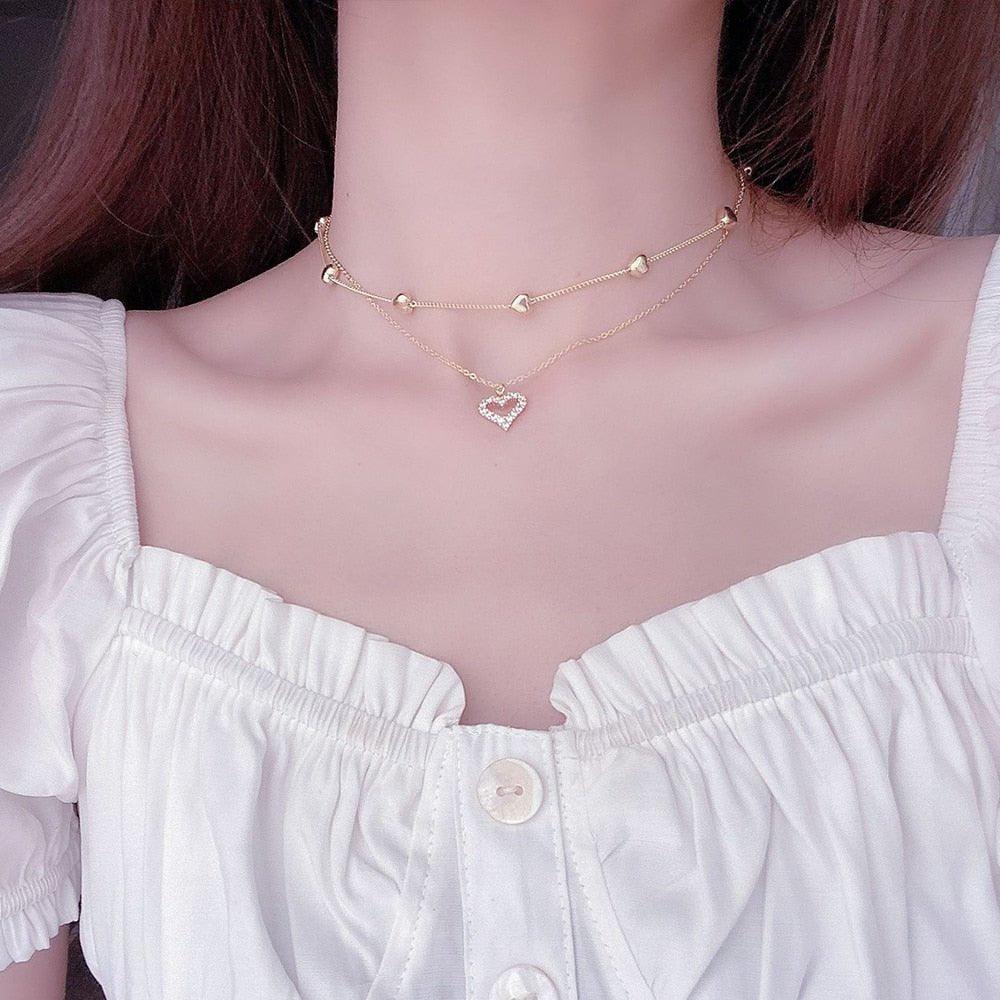 Collier pendentif coeur avec strass double tour plaqué or