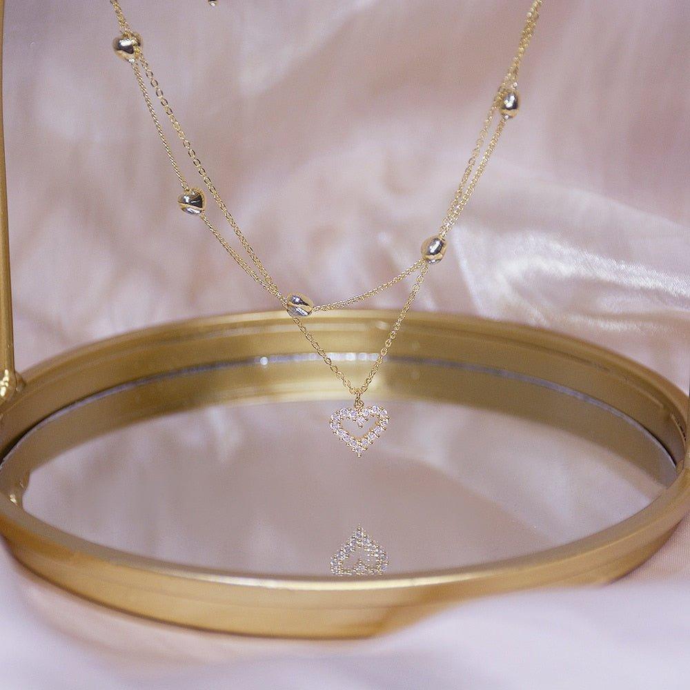 Collier pendentif coeur avec strass double tour plaqué or