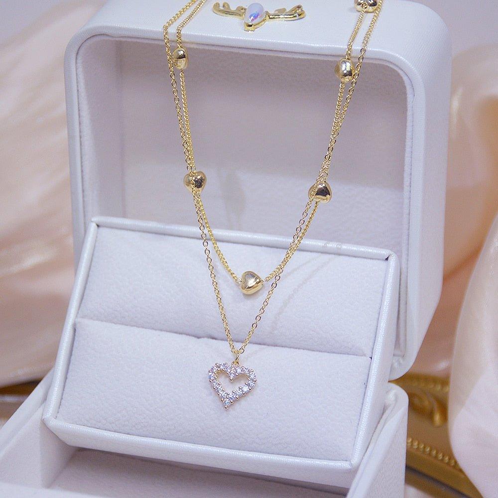 Collier pendentif coeur avec strass double tour plaqué or