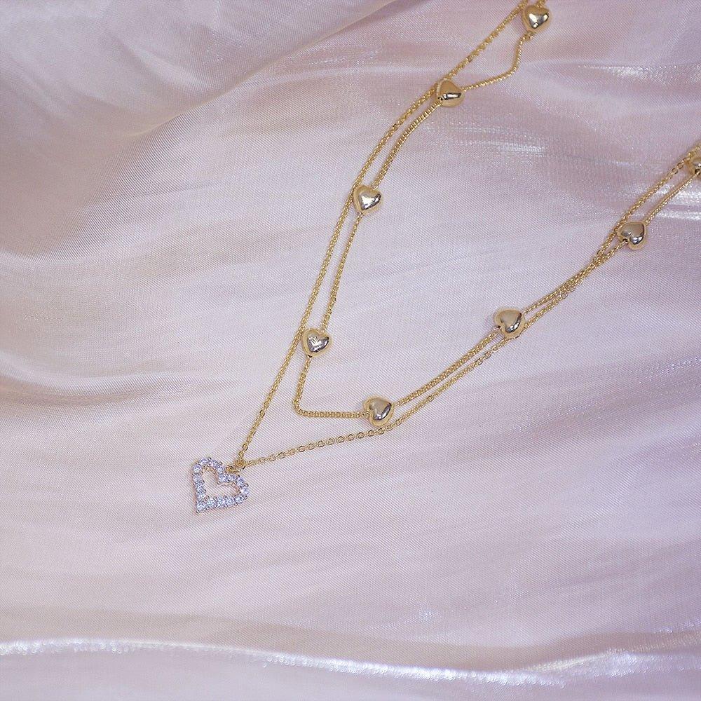 Collier pendentif coeur avec strass double tour plaqué or