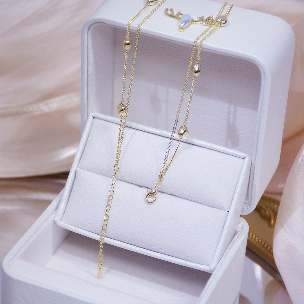 Collier pendentif coeur avec strass double tour plaqué or