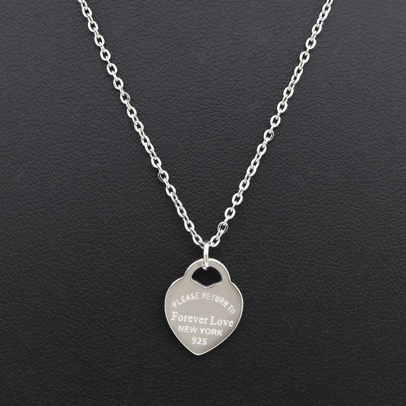 Collier pendentif coeur plat plaqué argent / or / or rose