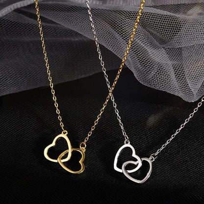 Collier pendentif coeurs entrelacés plaqué argent / or