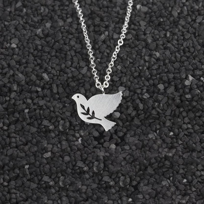 Collier pendentif colombe à fleur plaqué or / or rose / argent