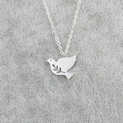 Collier pendentif colombe à fleur plaqué or / or rose / argent