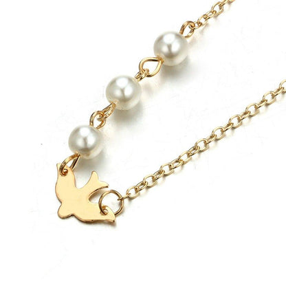 Collier pendentif colombe et perles ras le cou