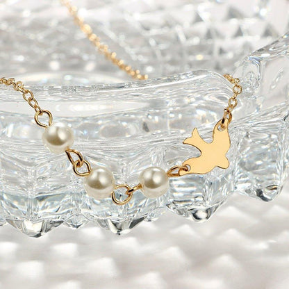 Collier pendentif colombe et perles ras le cou
