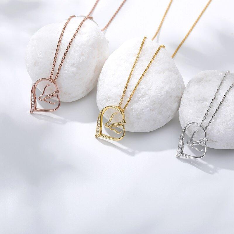 Collier pendentif double chevaux avec strass plaqué or / or rose / argent