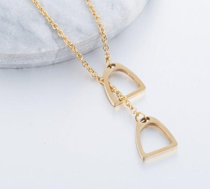 Collier pendentif double étrier cheval plaqué or / or rose / argent
