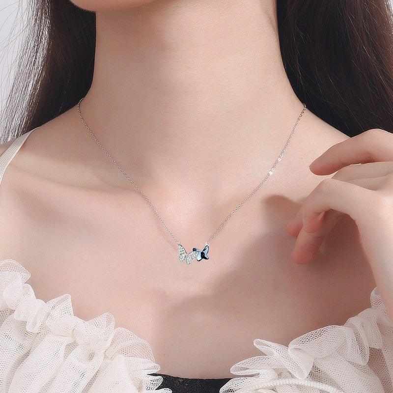 Collier pendentif double papillon bleu et strass en argent 925
