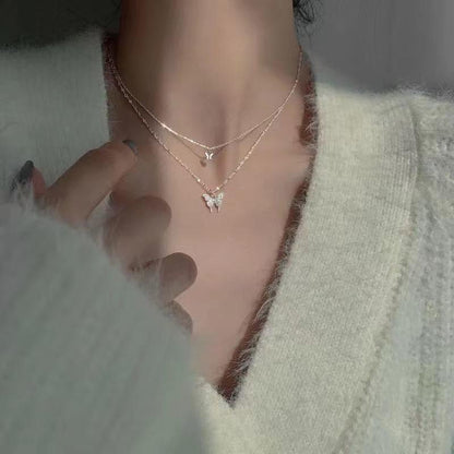 Collier pendentif double papillon plaqué argent