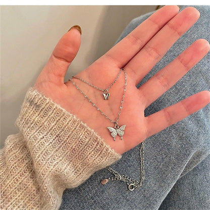 Collier pendentif double papillon plaqué argent