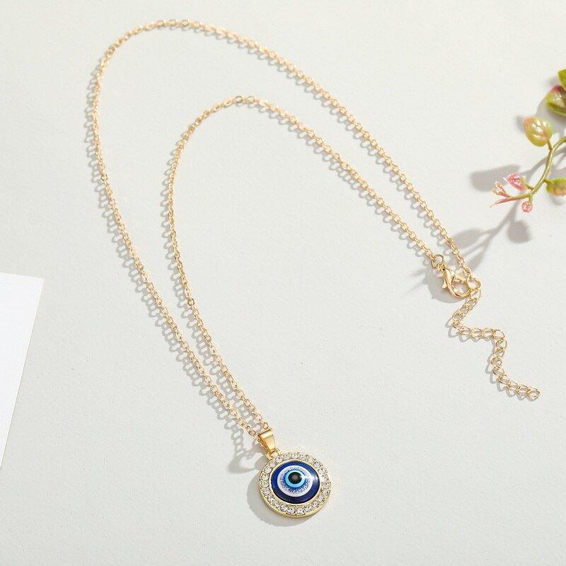 Collier pendentif grand œil bleu rond