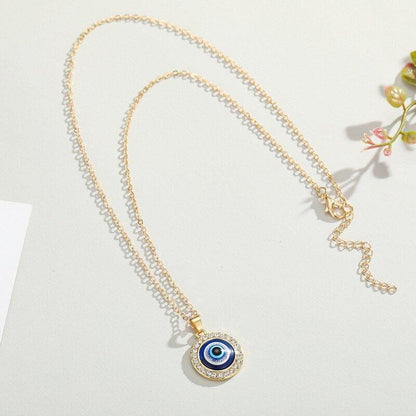 Collier pendentif grand œil bleu rond