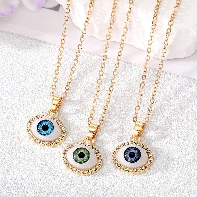 Collier pendentif grand oeil entouré de strass
