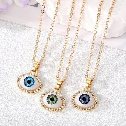 Collier pendentif grand oeil entouré de strass