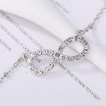 Collier pendentif infini cristal plaqué or / argent